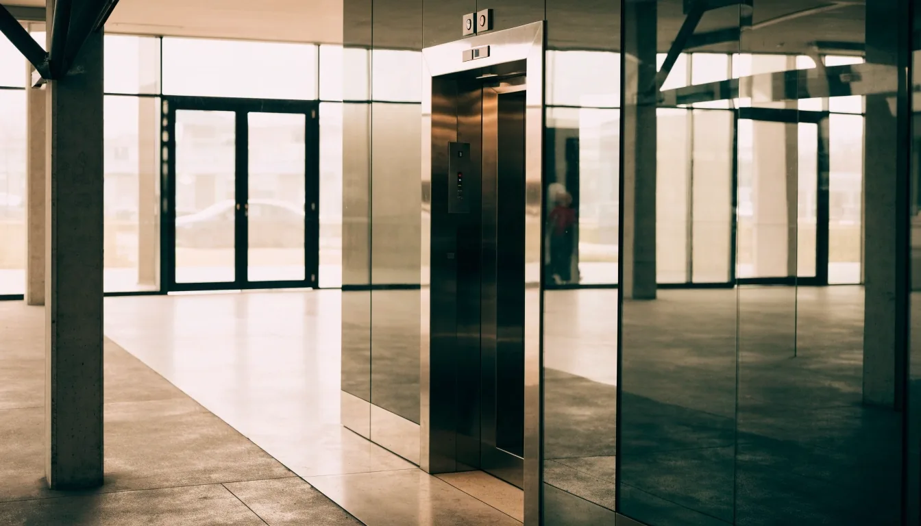 Car park lift lobby threshold with terminal doors visible beyond